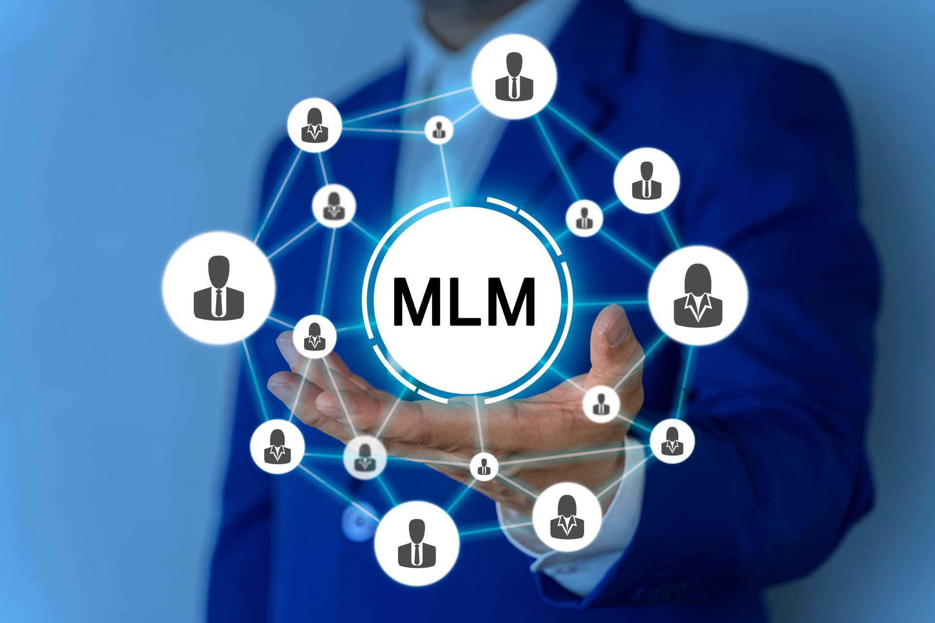 MLM, Man Working on Holographic Interface, Visual Screen. HR, human resource management concept
